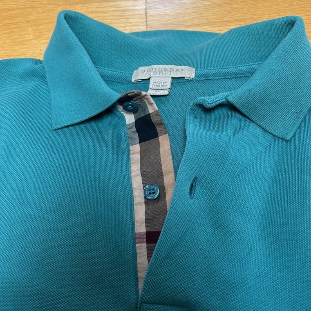 Burberry Polo small size. Dry cleaned.